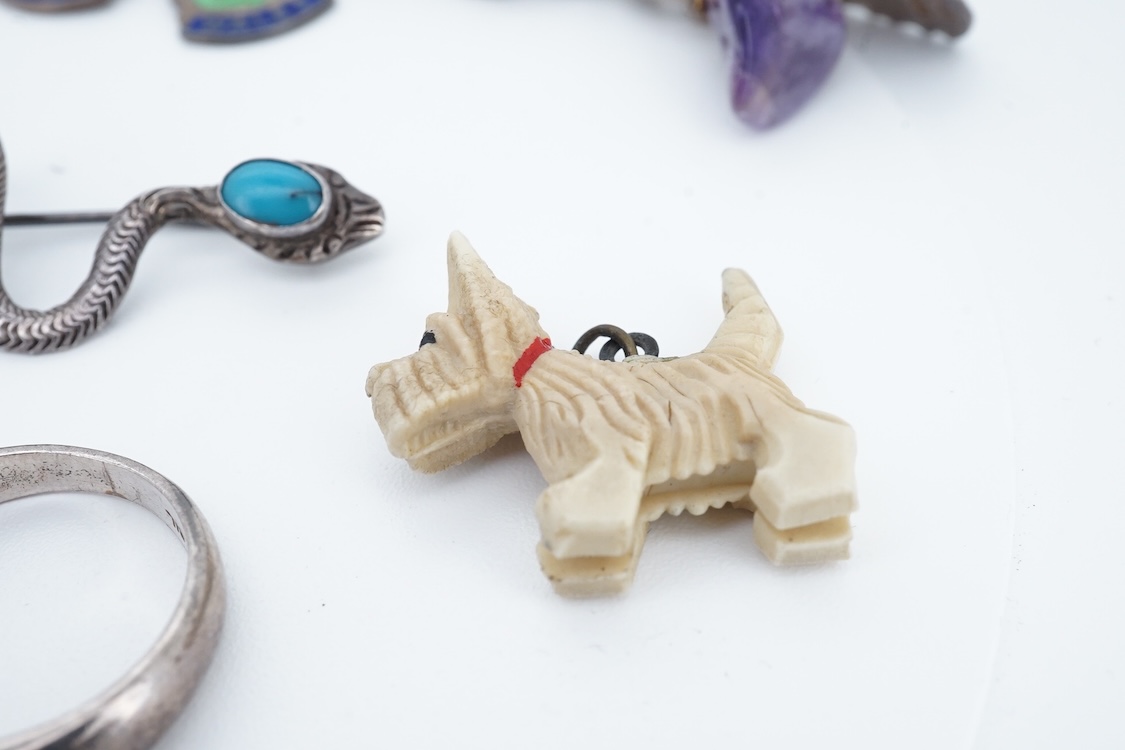 A small group of sterling, white metal and and other jewellery, including a charm bracelet, frog brooch, etc.